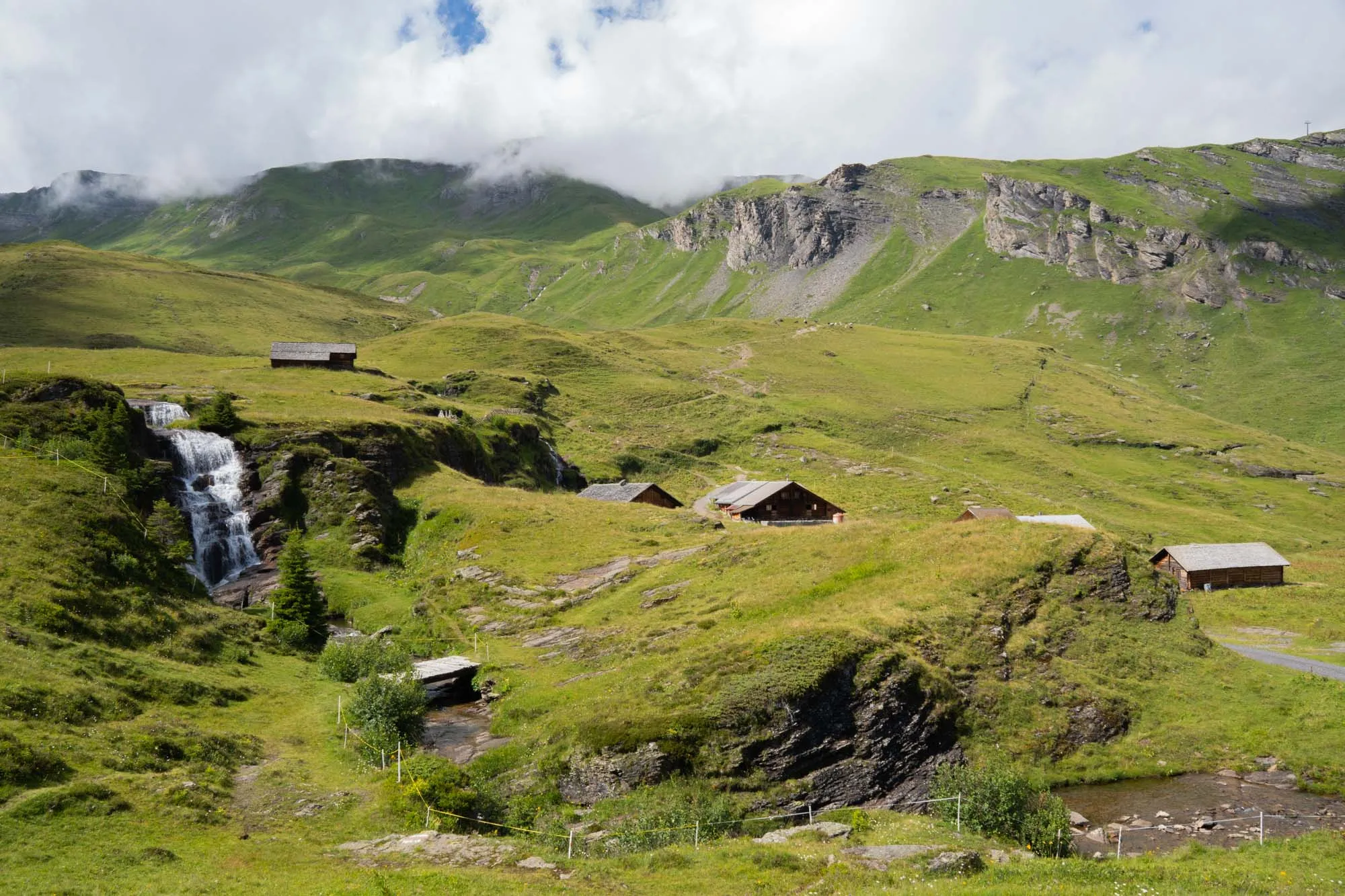 grindelwald huts and waterfall